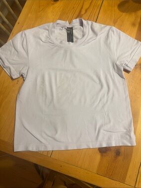 Bandit Running pale lavender baby stretch tee size xs